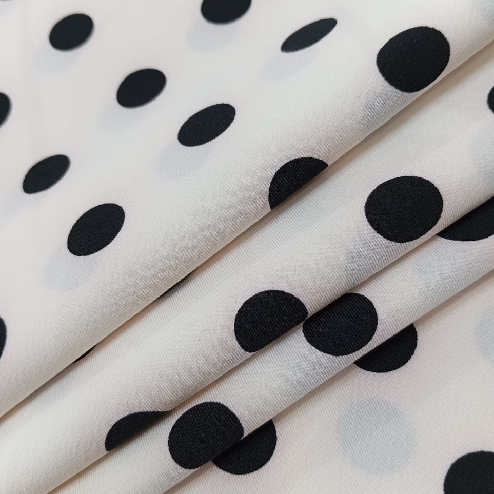 Polka Dot Print On Papaya Twill Fabric