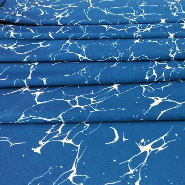 Blue And White Marble Print On Snake Crepe Fabric